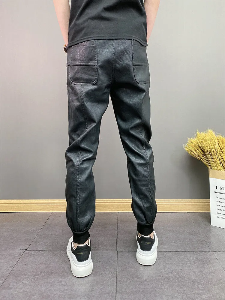 Black waterproof windproof casual rider motorcycle tapered pants with artificial leather lining and mid-rise waist