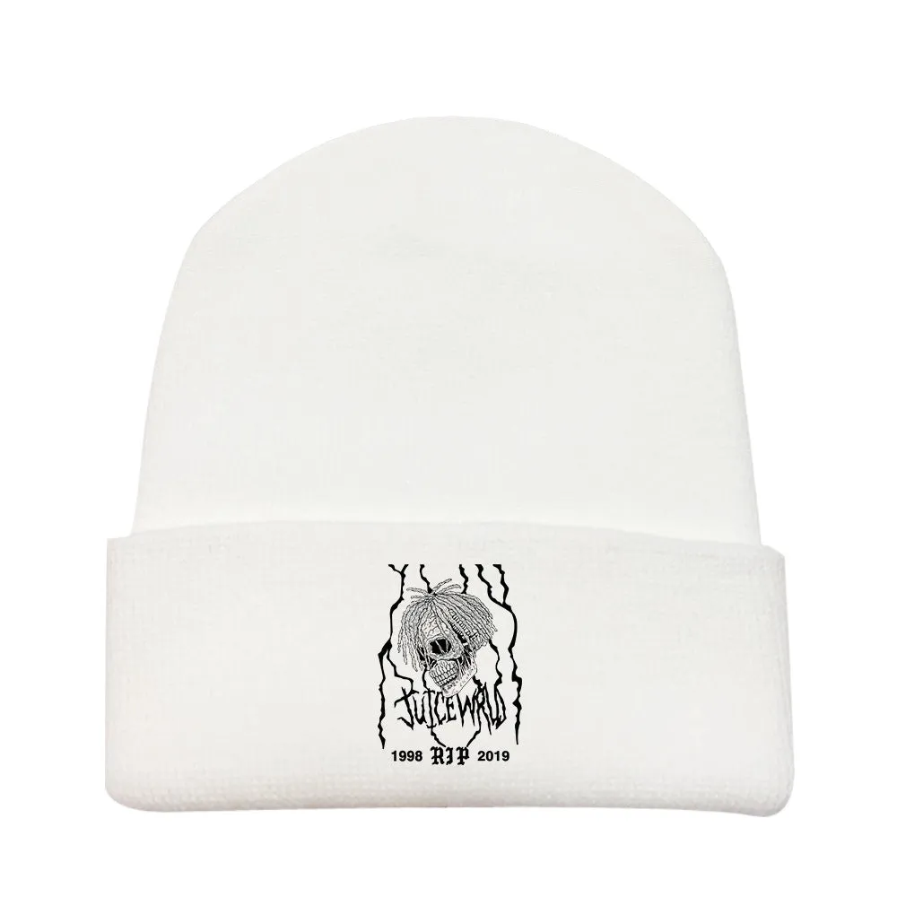 Wool knitted winter hat with flat top and curling brim in monochrome flower print