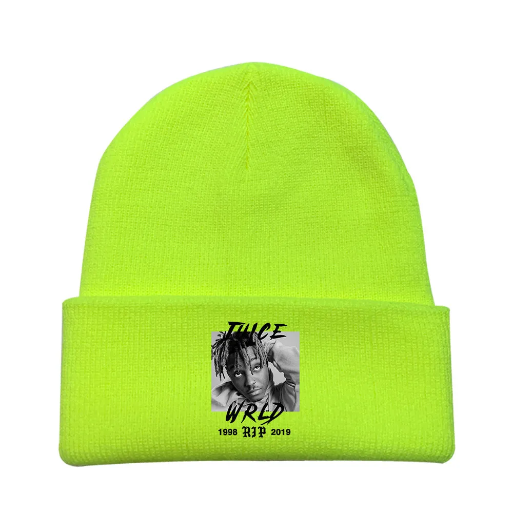 Wool knitted winter hat with flat top and curling brim in monochrome flower print