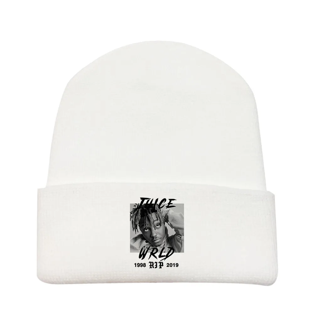 Wool knitted winter hat with flat top and curling brim in monochrome flower print