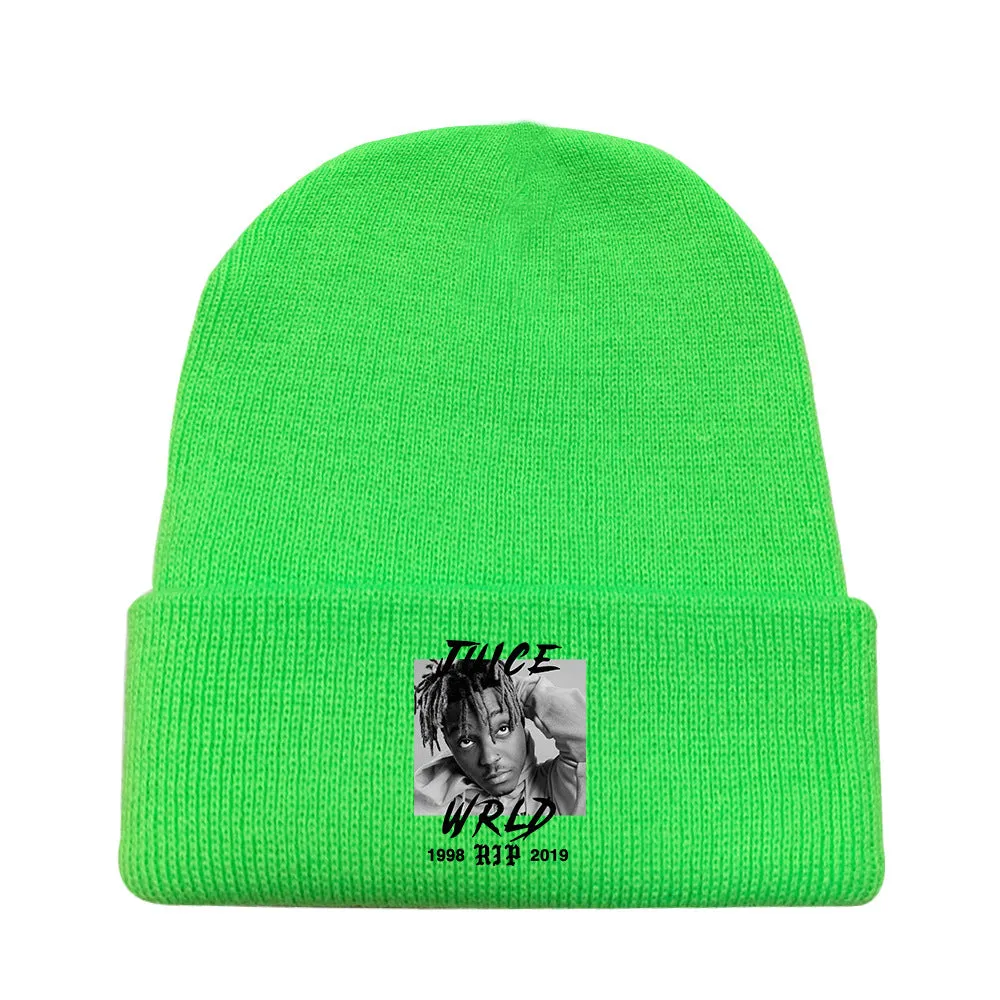 Wool knitted winter hat with flat top and curling brim in monochrome flower print