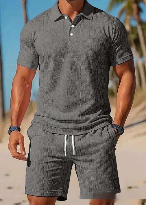 Men's casual beach mesh lapel set with short-sleeved shirt and shorts in polyester fibre, available in multiple colours.