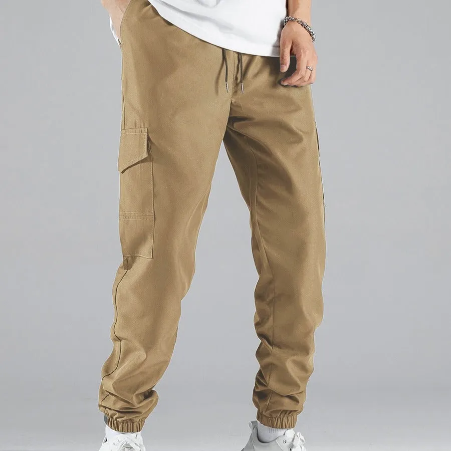 Men's multi-pocket workwear trousers in army green with drawstring waist, side and back pockets, straight leg cut