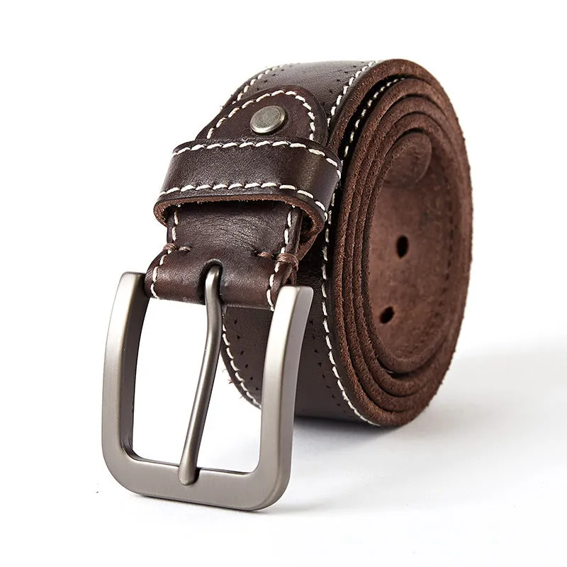 Washed leather belt in khaki with alloy pin buckle on a neutral background