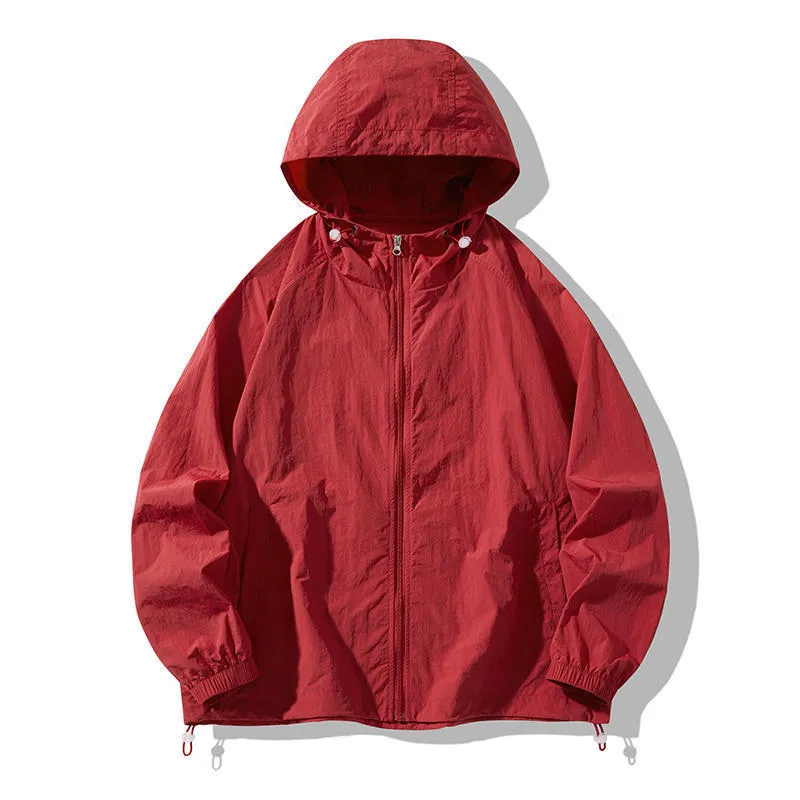 Loose fit unisex outdoor sports jacket in nylon blend fabric on a hanger.
