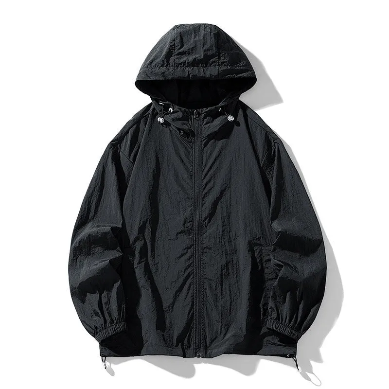 Loose fit unisex outdoor sports jacket in nylon blend fabric on a hanger.