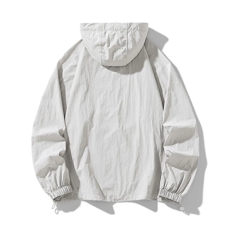 Loose fit unisex outdoor sports jacket in nylon blend fabric on a hanger.