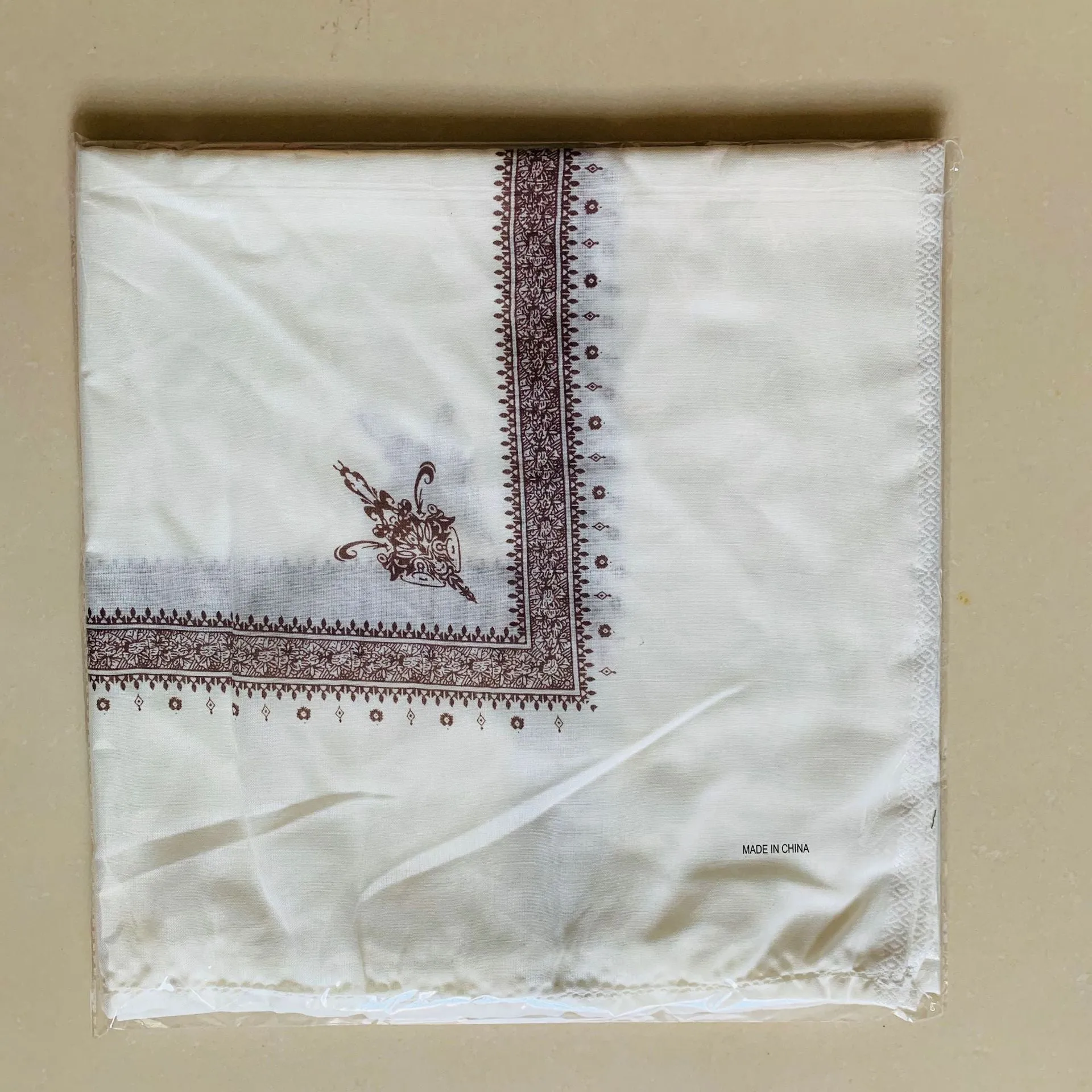 Printed square polyester scarf in six colour options measuring 138cm x 138cm