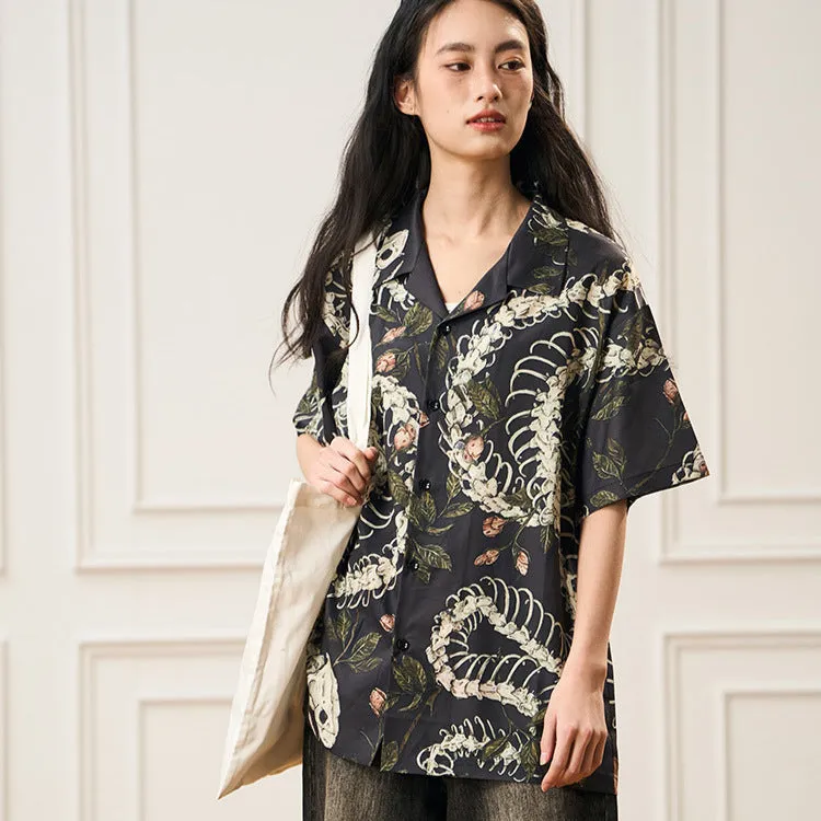 Short sleeve loose fit Cuban collar shirt with a printed snake bone pattern design in a colour option.