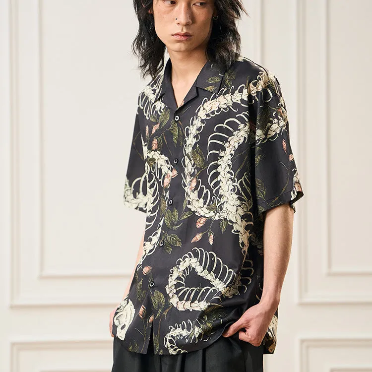 Short sleeve loose fit Cuban collar shirt with a printed snake bone pattern design in a colour option.