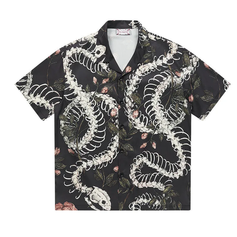 Short sleeve loose fit Cuban collar shirt with a printed snake bone pattern design in a colour option.