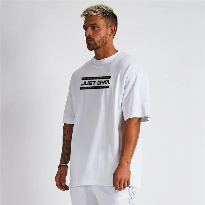 Men's five-point sleeve bodybuilding sports T-shirt in cotton, round neck, black colour, front view