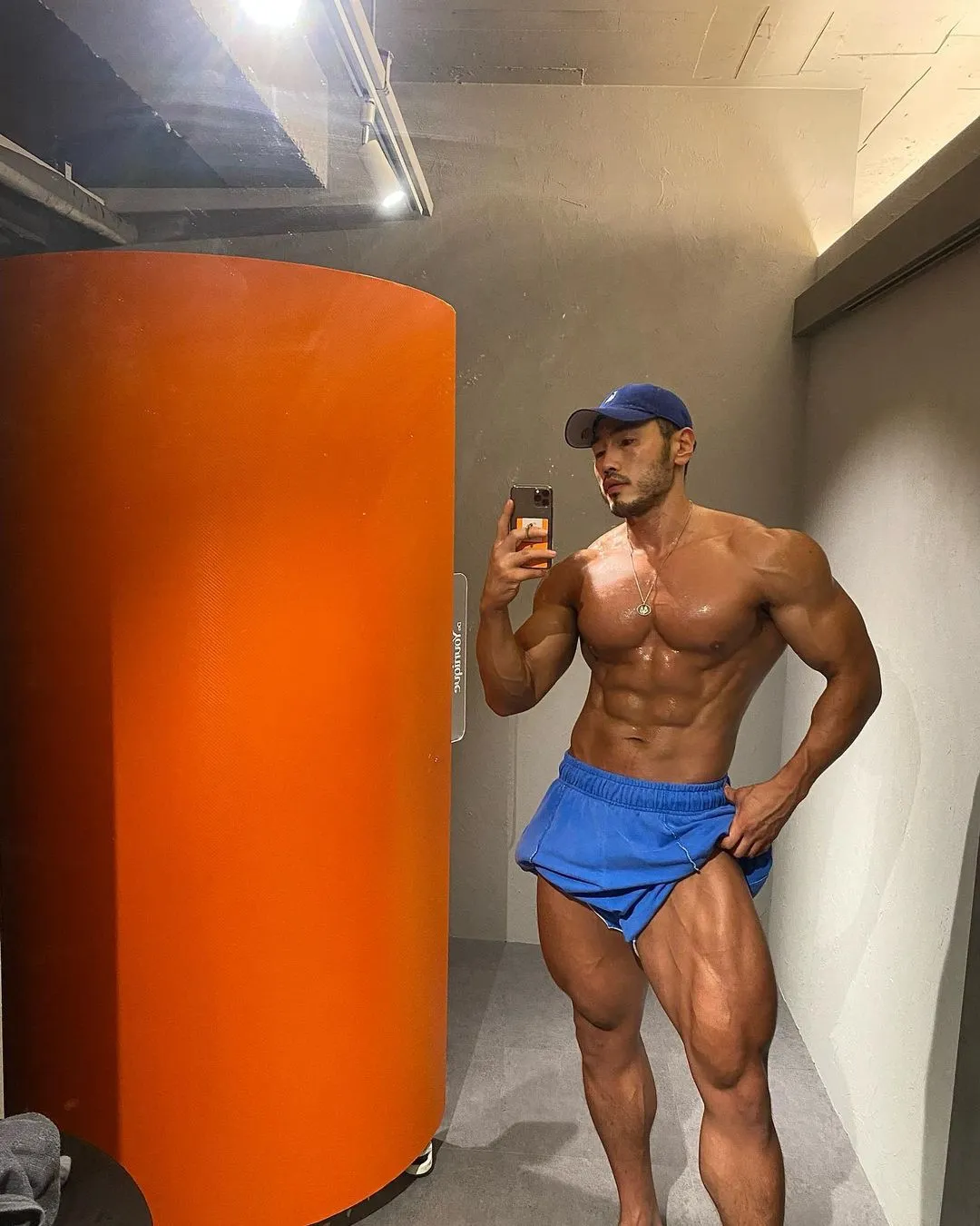 Mens cotton stretch sports fitness shorts in black, blue, green, and light gray for gym and training
