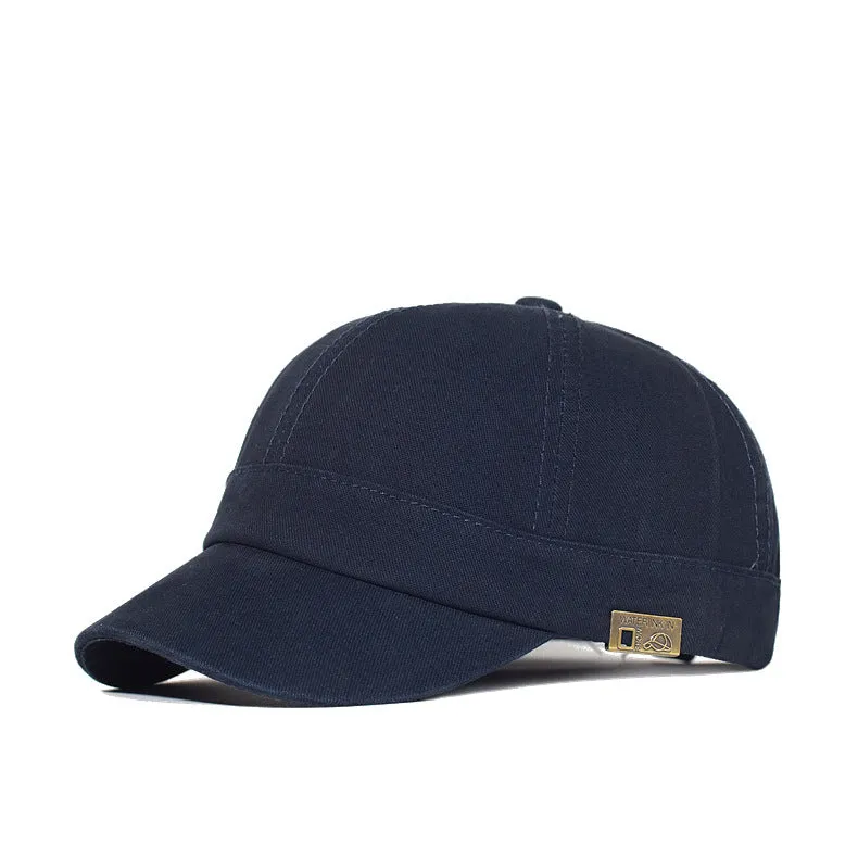 Unstructured cotton dad hat in khaki with short 5.5 cm brim and adjustable strap, front view