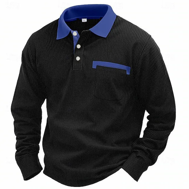 Man wearing a dark grey long-sleeved waffle-texture polo shirt with an asymmetric design detail.