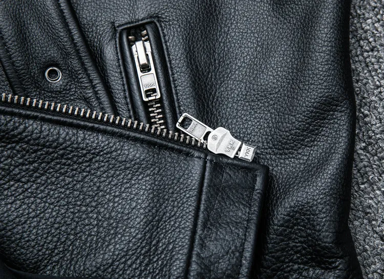 Pure cowhide biker's leather jacket in black with front zip and snap collar, full-length sleeves, polyester lining