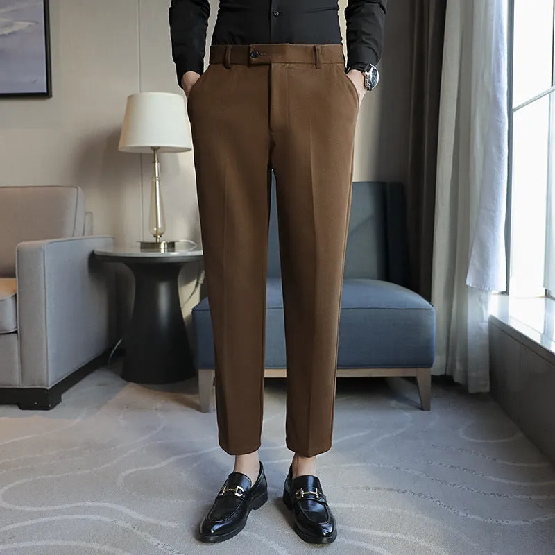 Men's straight cut brown corduroy trousers with elastic waistband shown front and side view