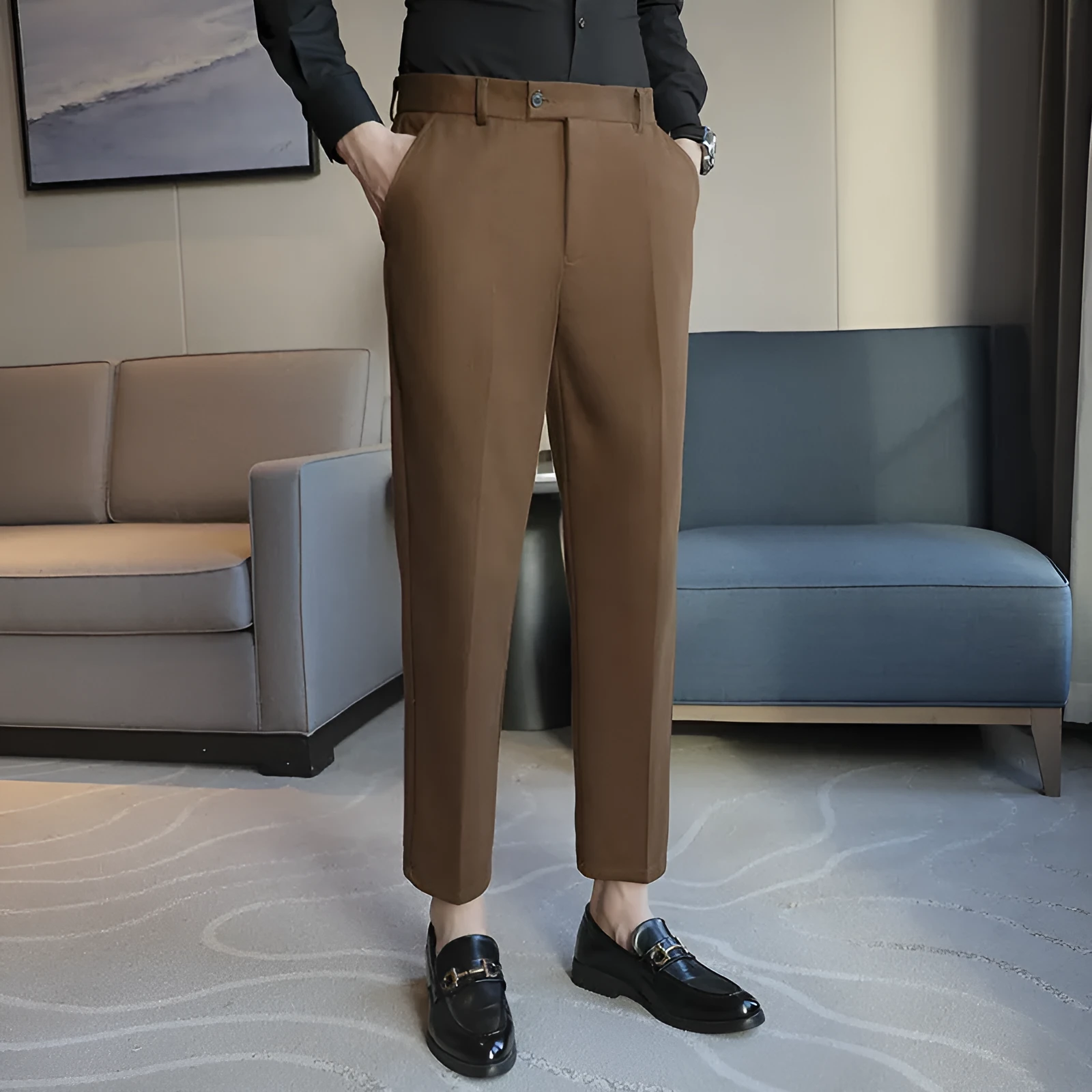 Men's straight cut brown corduroy trousers with elastic waistband shown front and side view