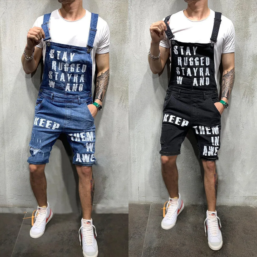 Men's black braces ripped jeans jumpsuit with adjustable shoulder straps on a model