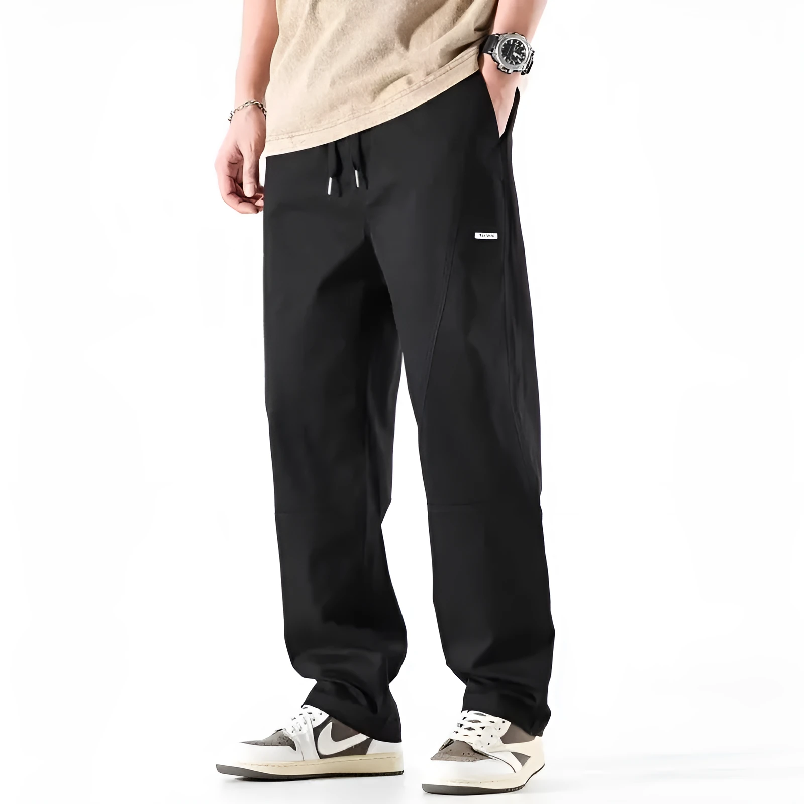 Beige cotton wide-leg casual trousers with elasticated waistband displayed flat