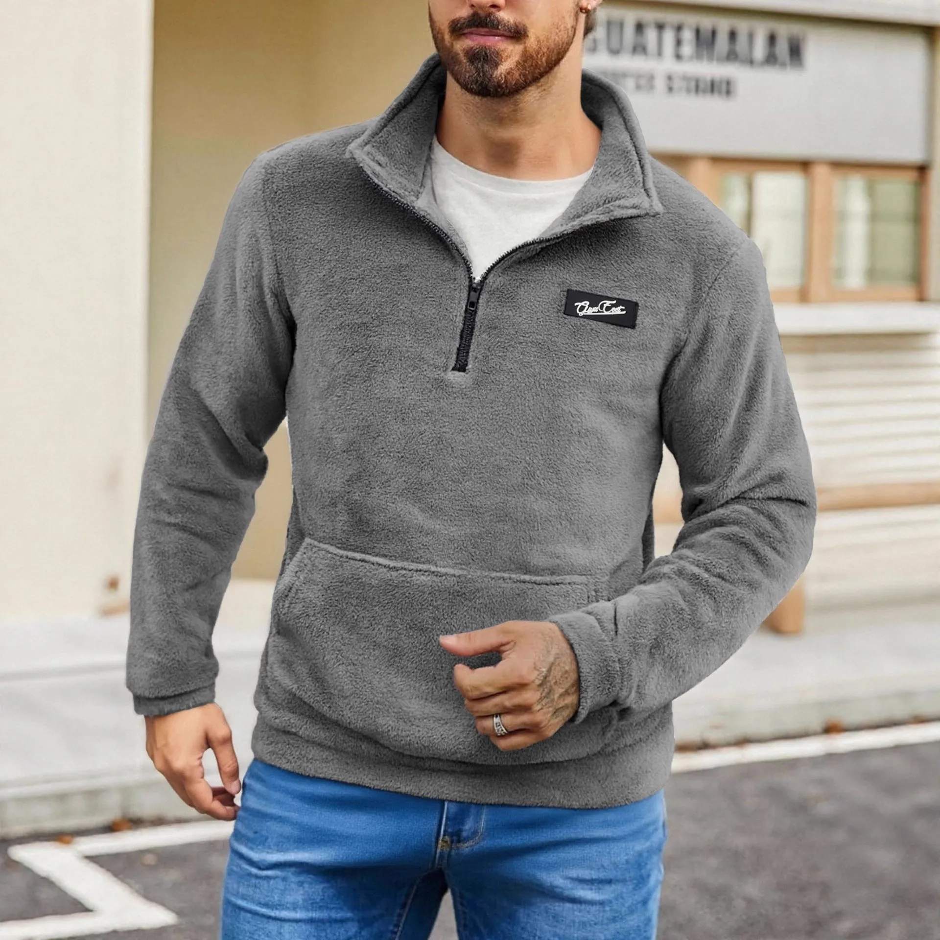 Stand collar loose long sleeve half-zip sweatshirt in grey, front view