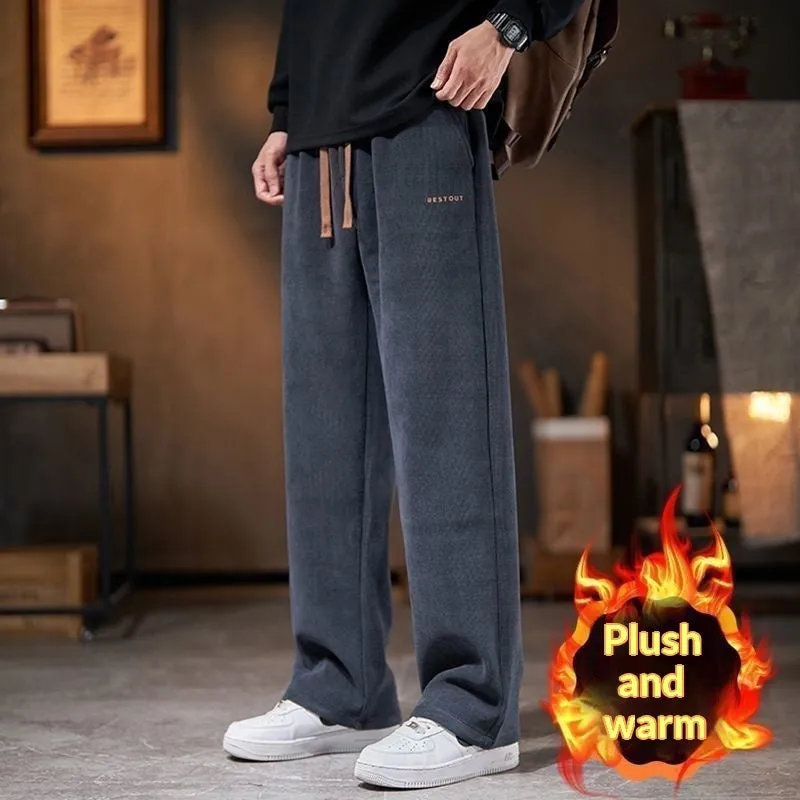 Men's loose straight-leg fleece-lined trousers in dark gray, polyester fabric, mid-rise waist, side view