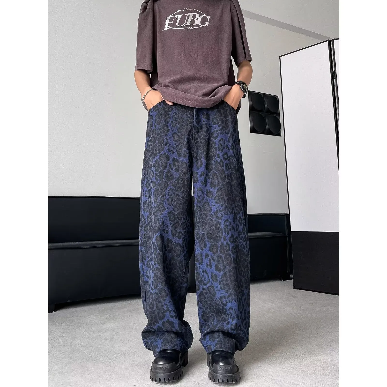 Blue cotton leopard print wide-leg pants with zip fly, full-length view