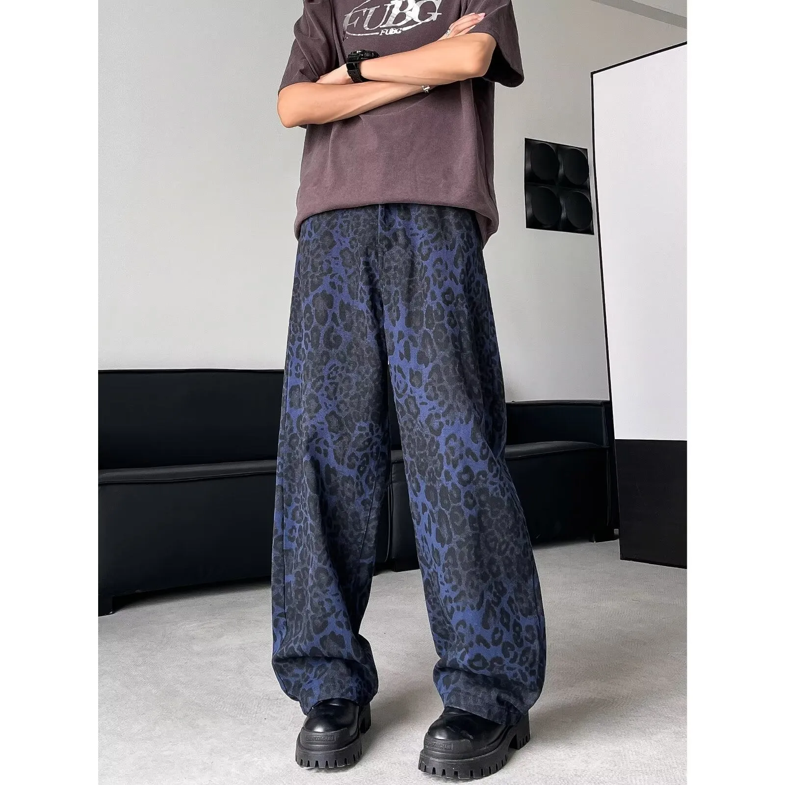 Blue cotton leopard print wide-leg pants with zip fly, full-length view