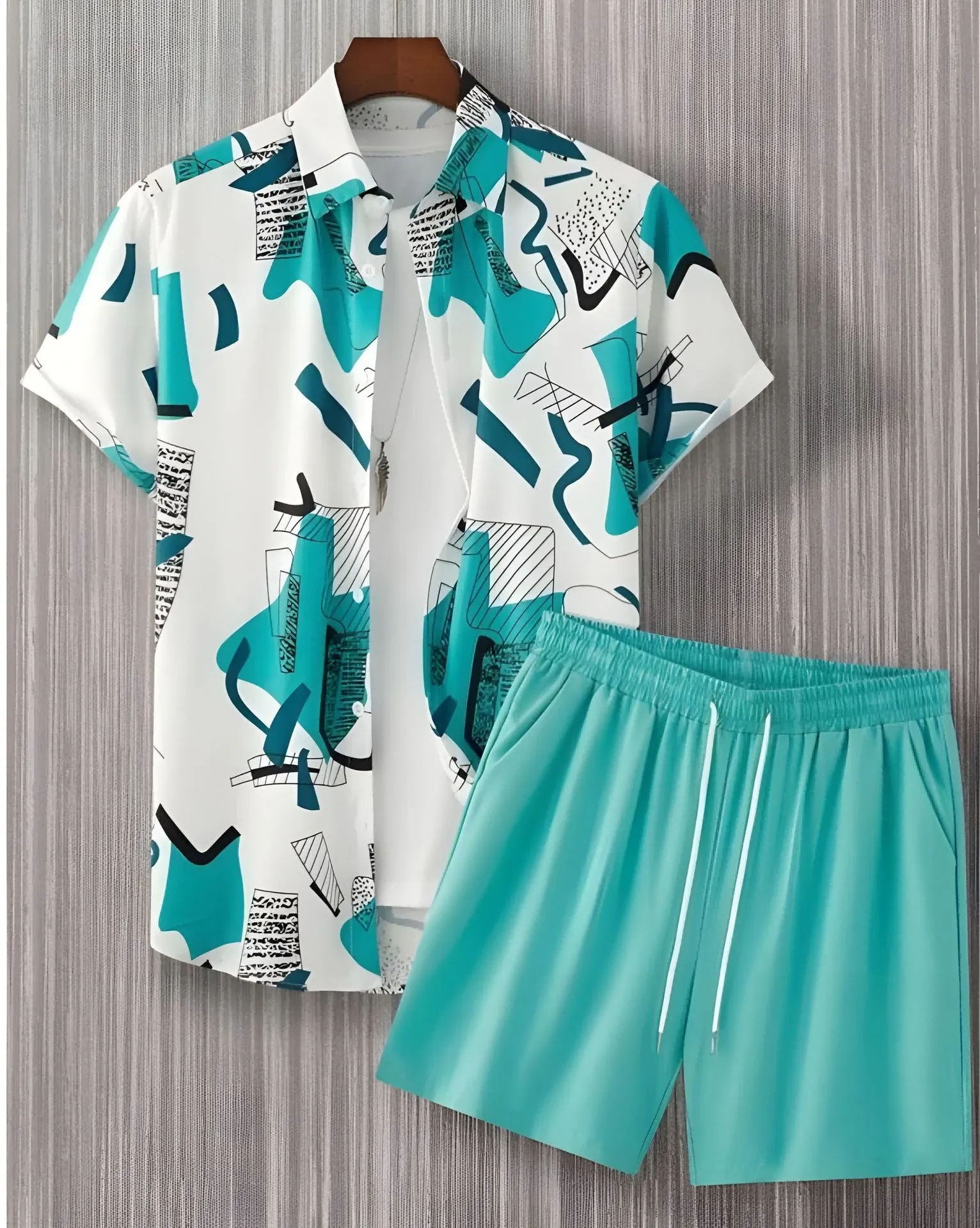 Black and white striped Hawaiian men's pullover shirt and shorts set on a model, loose fit, short sleeves.