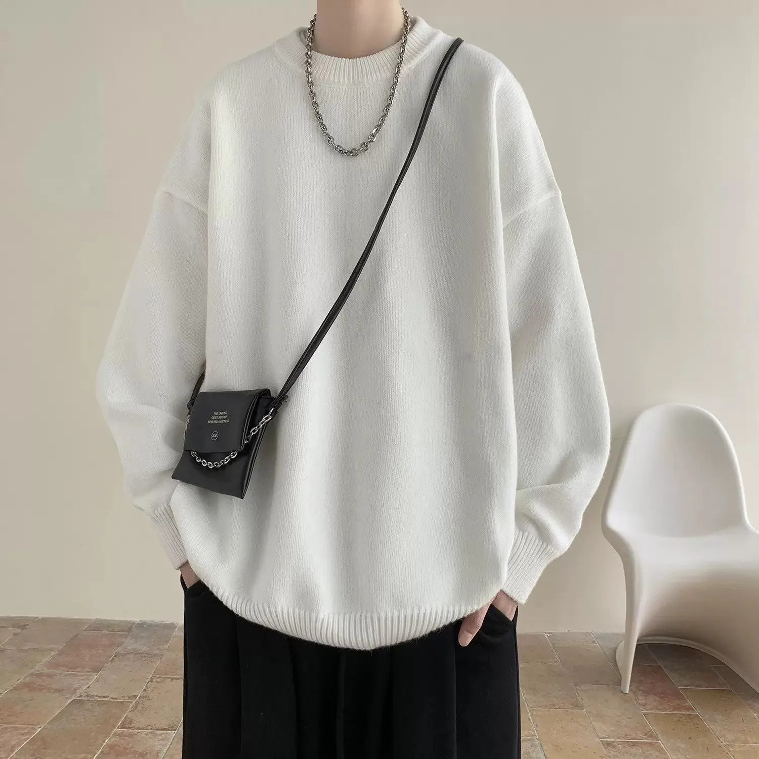 Men's Korean version round neck sweater in loose fit synthetic blend, available in multiple colours
