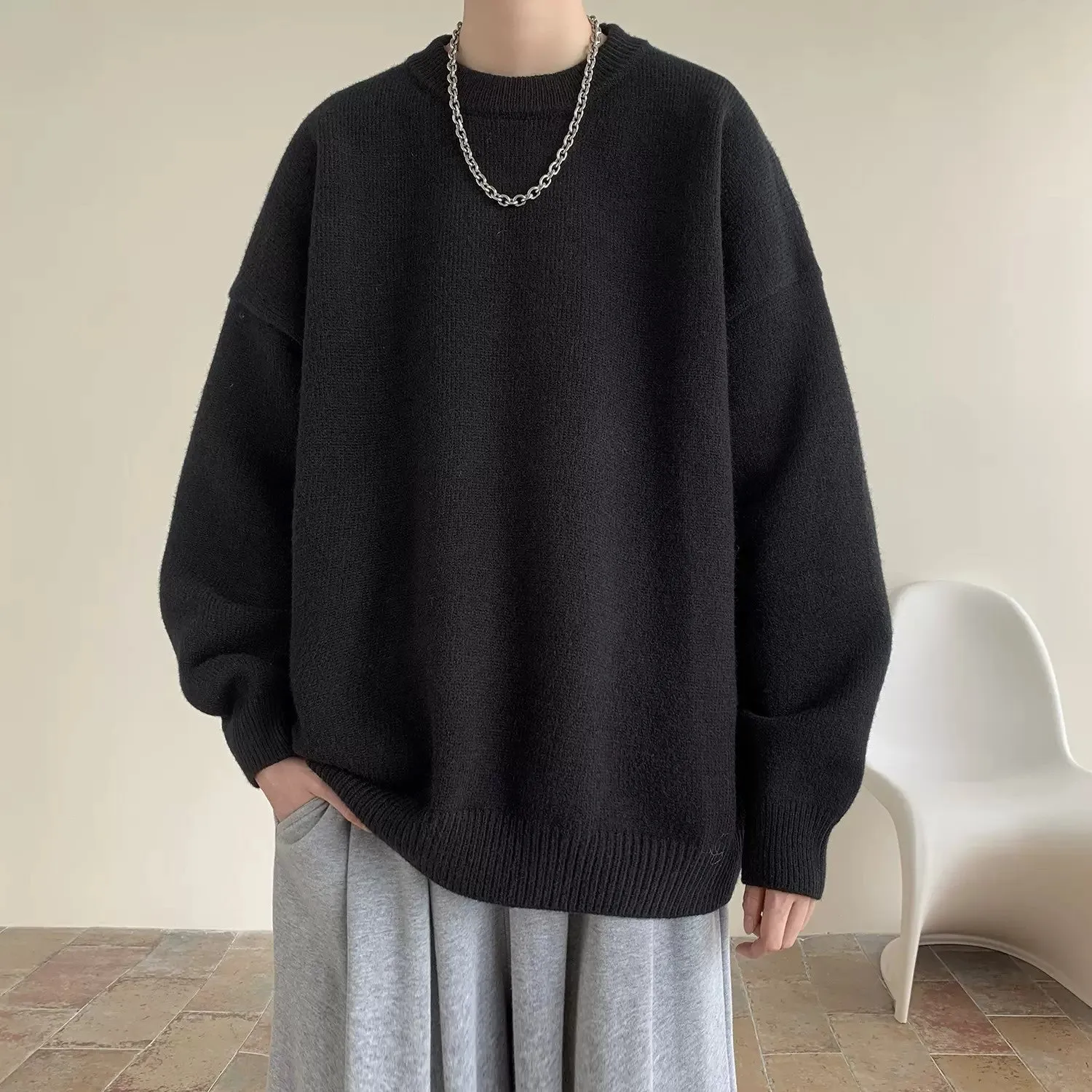Men's Korean version round neck sweater in loose fit synthetic blend, available in multiple colours