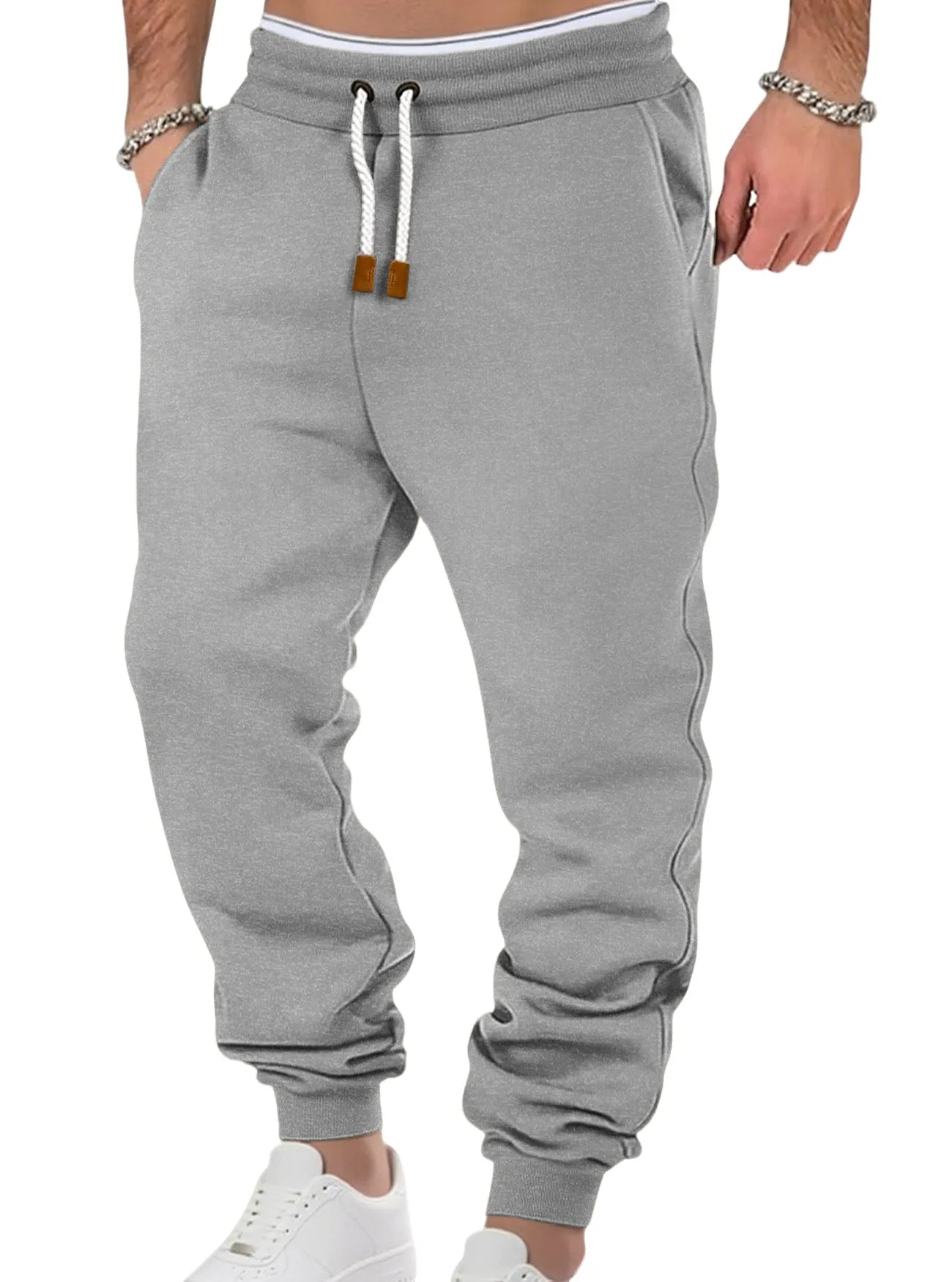 Men's solid colour fleece-lined cuffed sweatpants in army green with drawstring waist