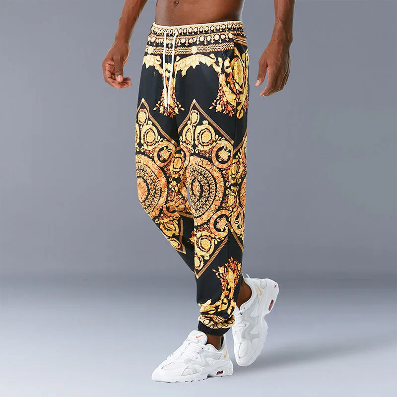 Printed jogging pants in loose fit with drawstring waist, small leg opening, and ribbed hem, available in multiple colours