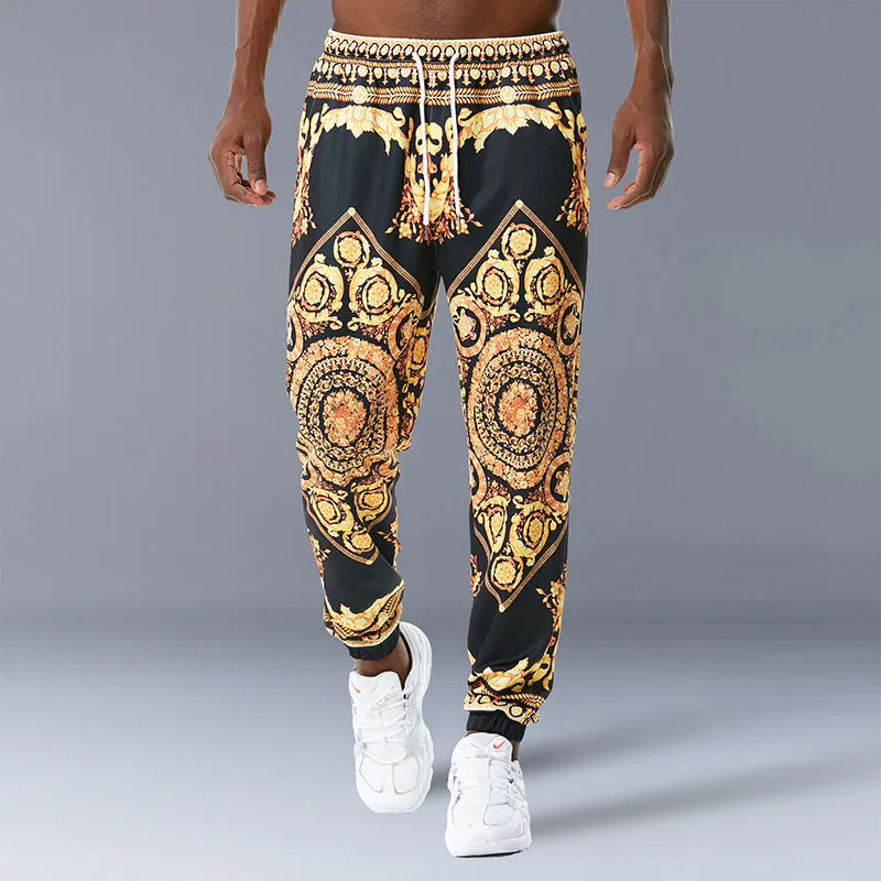 Printed jogging pants in loose fit with drawstring waist, small leg opening, and ribbed hem, available in multiple colours