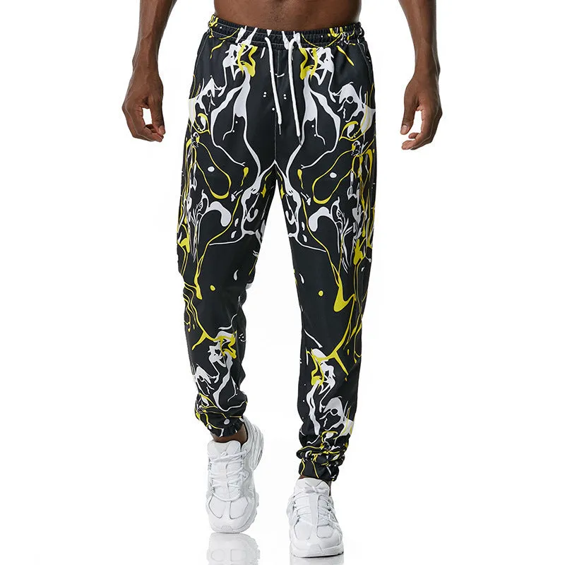 Printed jogging pants in loose fit with drawstring waist, small leg opening, and ribbed hem, available in multiple colours