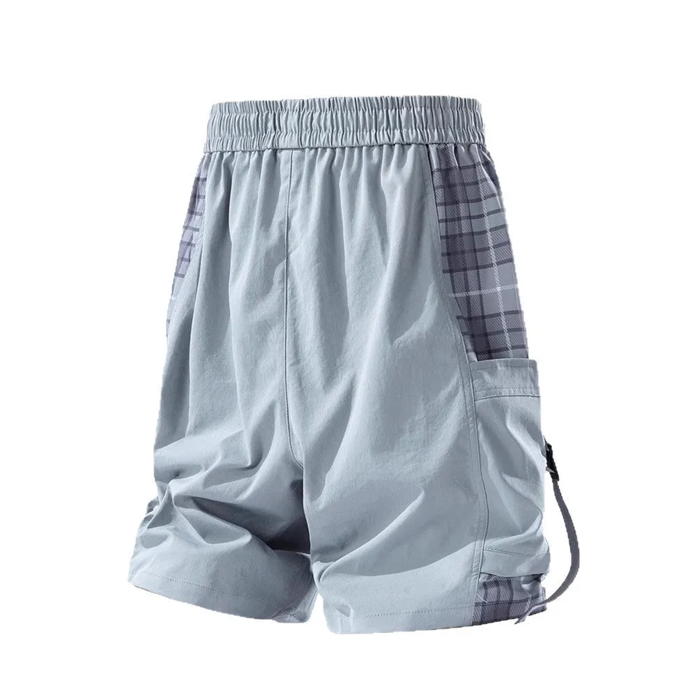 Men's casual cargo shorts with plaid stitching detail in loose fit design