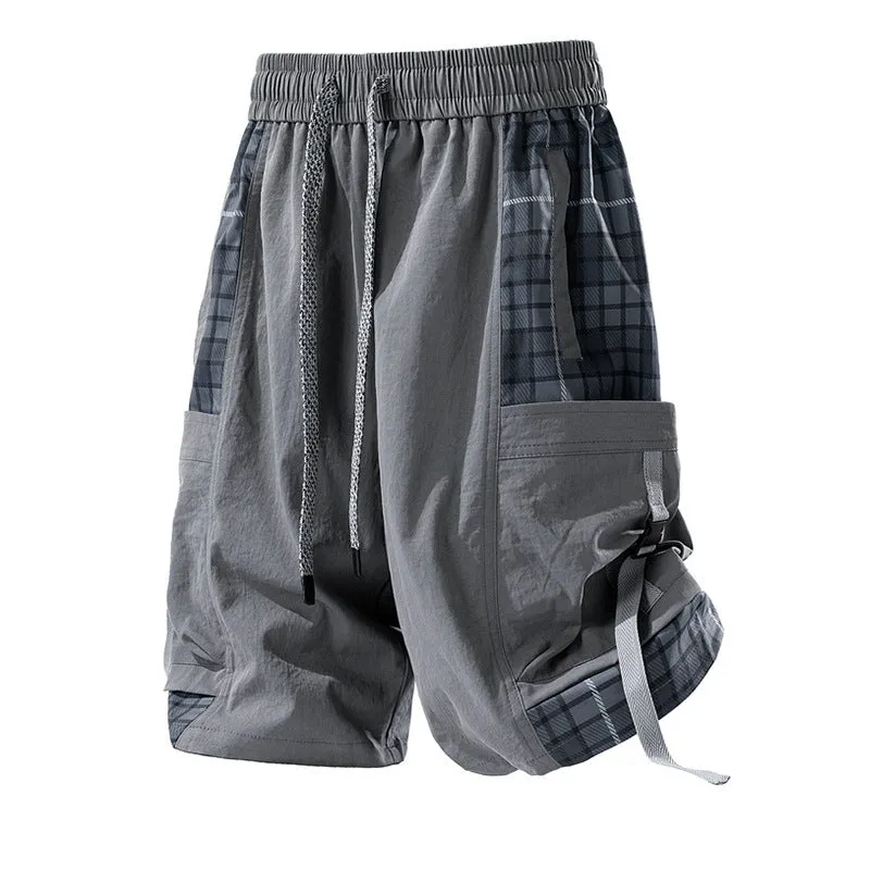 Men's casual cargo shorts with plaid stitching detail in loose fit design
