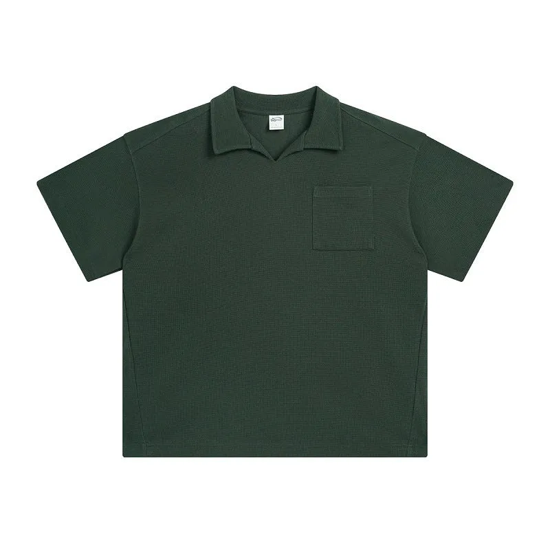 Cotton loose-fit drop-shoulder short sleeve top in Paris forest green, front view, with simple lapel neckline