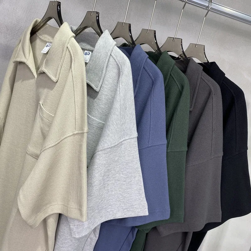 Cotton loose-fit drop-shoulder short sleeve top in Paris forest green, front view, with simple lapel neckline