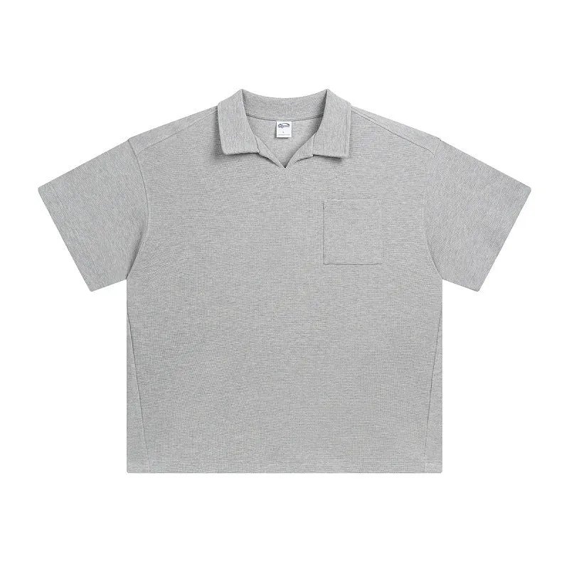 Cotton loose-fit drop-shoulder short sleeve top in Paris forest green, front view, with simple lapel neckline