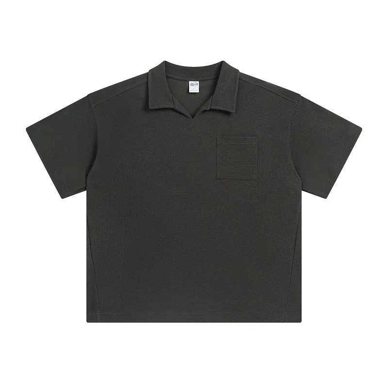 Cotton loose-fit drop-shoulder short sleeve top in Paris forest green, front view, with simple lapel neckline