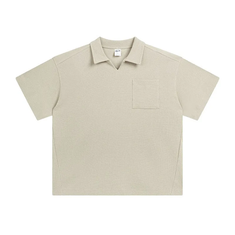 Cotton loose-fit drop-shoulder short sleeve top in Paris forest green, front view, with simple lapel neckline