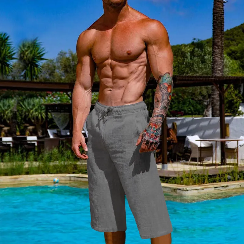 Men's loose linen blend cropped pants in khaki, shown on model, mid-waist straight leg