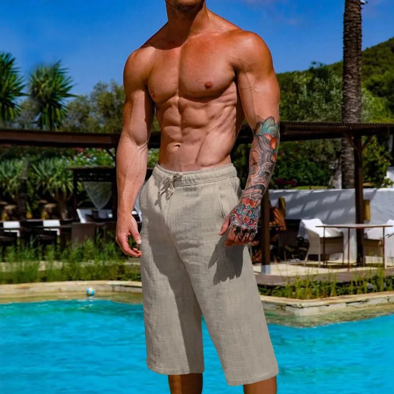 Men's loose linen blend cropped pants in khaki, shown on model, mid-waist straight leg