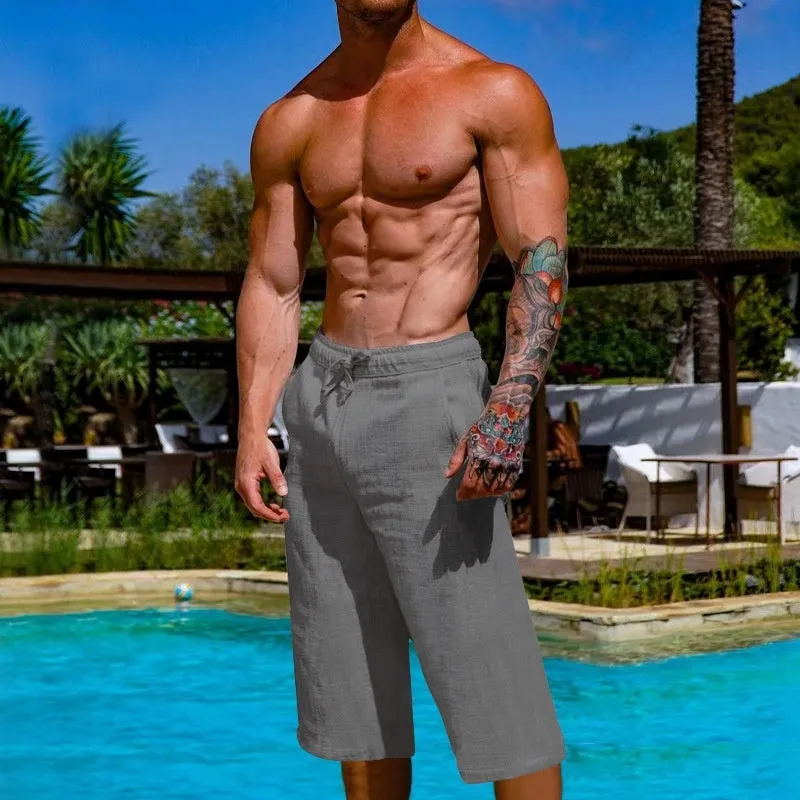 Men's loose linen blend cropped pants in khaki, shown on model, mid-waist straight leg