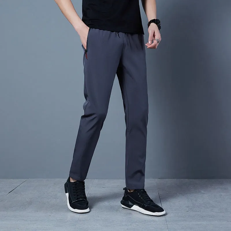 Men's solid colour loose casual pants in grey, black, blue polyester