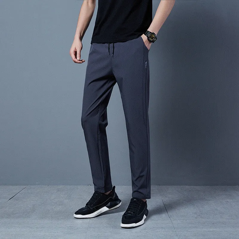 Men's solid colour loose casual pants in grey, black, blue polyester