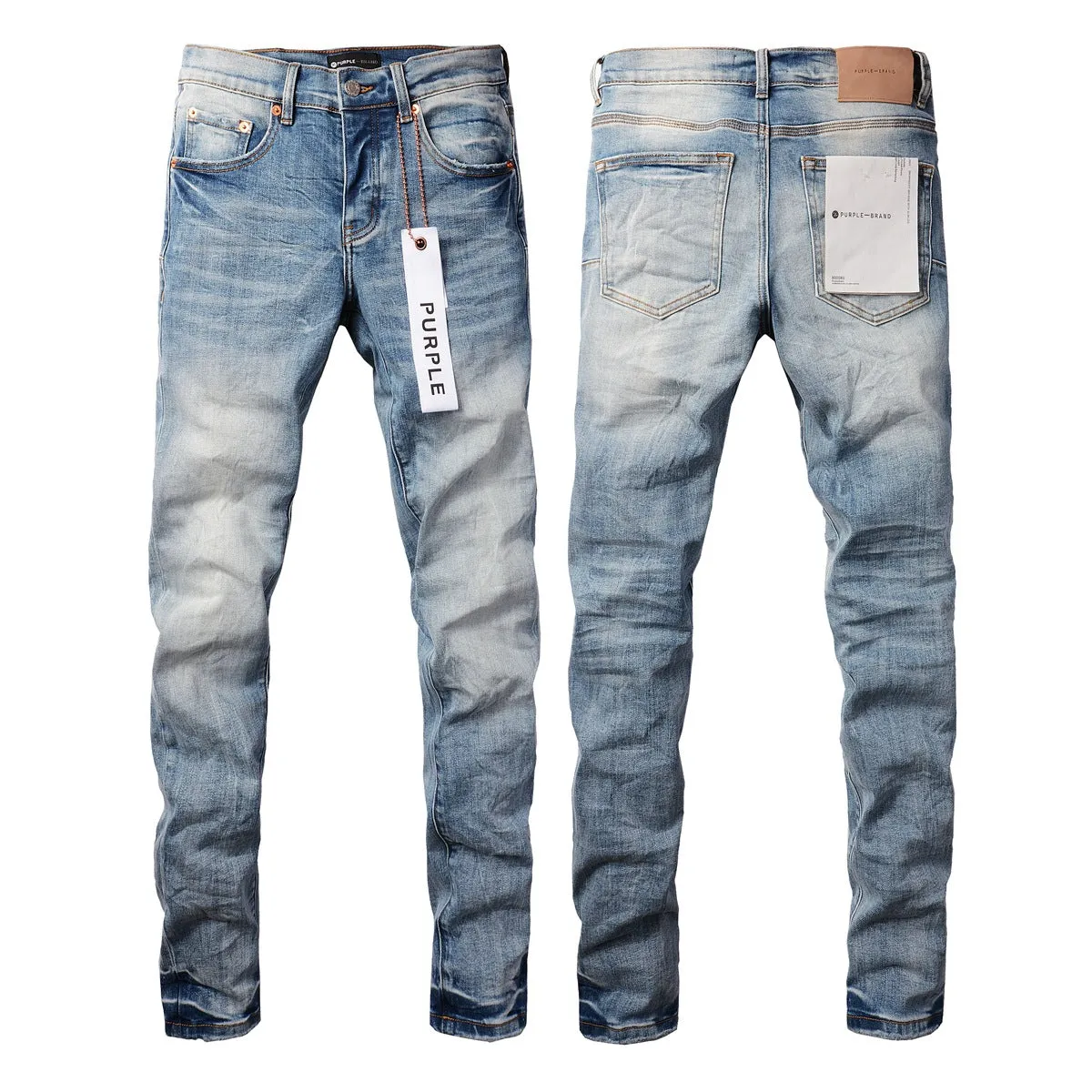 Men's blue denim pencil leg jeans with low waist and zipper fly on a person standing