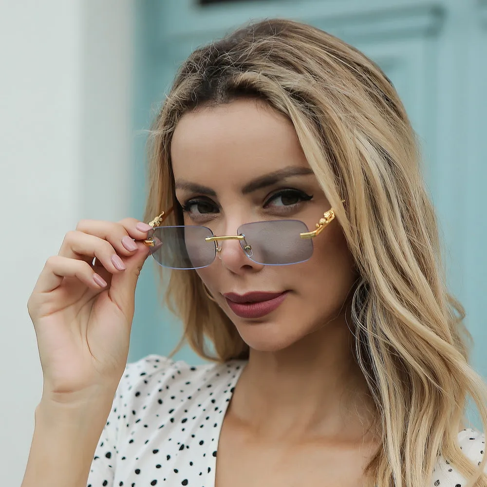 Gold metal leopard head frameless square sunglasses with pink PC lenses on a white background