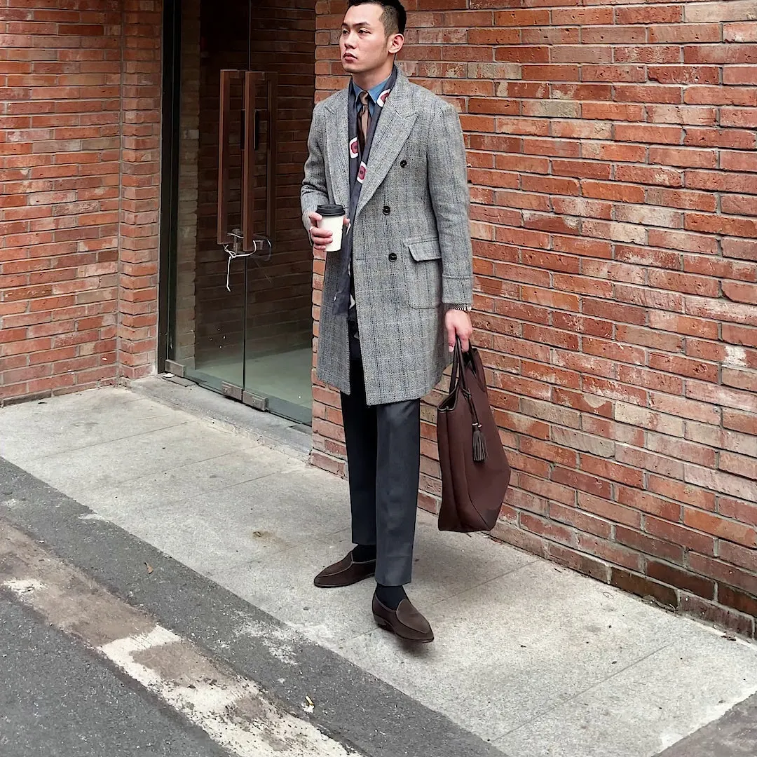 Grey wool plaid polo coat with notched lapel, single-breasted front, long sleeves, front view